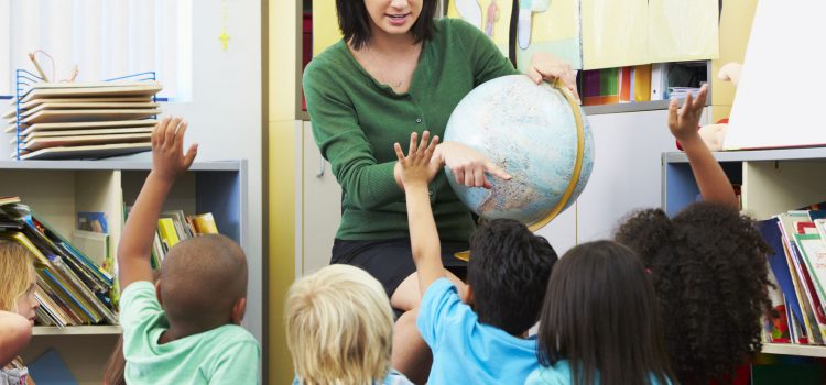 24488743 - elementary pupils in geography class with teacher